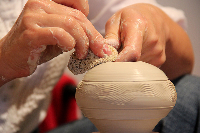 Gay travel gets their hands dirty in a pottery studio Santa Fe pottery