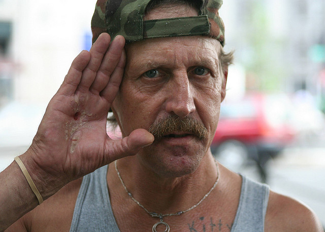 Homeless veteran in Dupont Circle, Washington, DC. Washington has the country's highest rate of veteran homelessness. photo via Elvert Barnes/Flickr)
