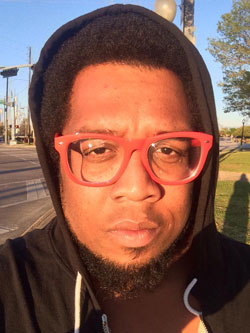 Chaaz Quigley, Black, activist, writer, glasses, queer, LGBT, Dallas
