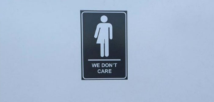Artist Fights Transphobia with Gender-Fluid ‘We Don’t Care’ Restroom Sign