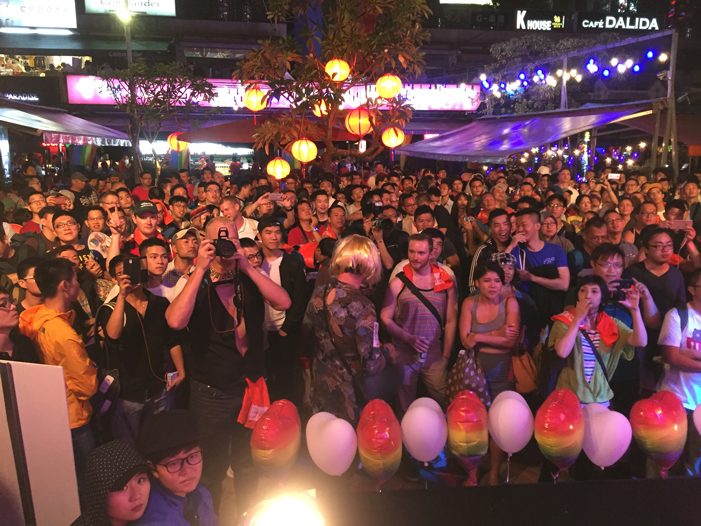 Taiwan, Taiwan Pride, parade, drag queen, Hornet, men, rainbow flags, LGBT, LGBTQ, queer, audience, concert, stage