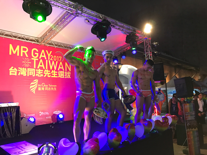 Taiwan, Taiwan Pride, parade, drag queen, Hornet, men, rainbow flags, LGBT, LGBTQ, queer, Mr. Gay Taiwan, stage, go-go dancers