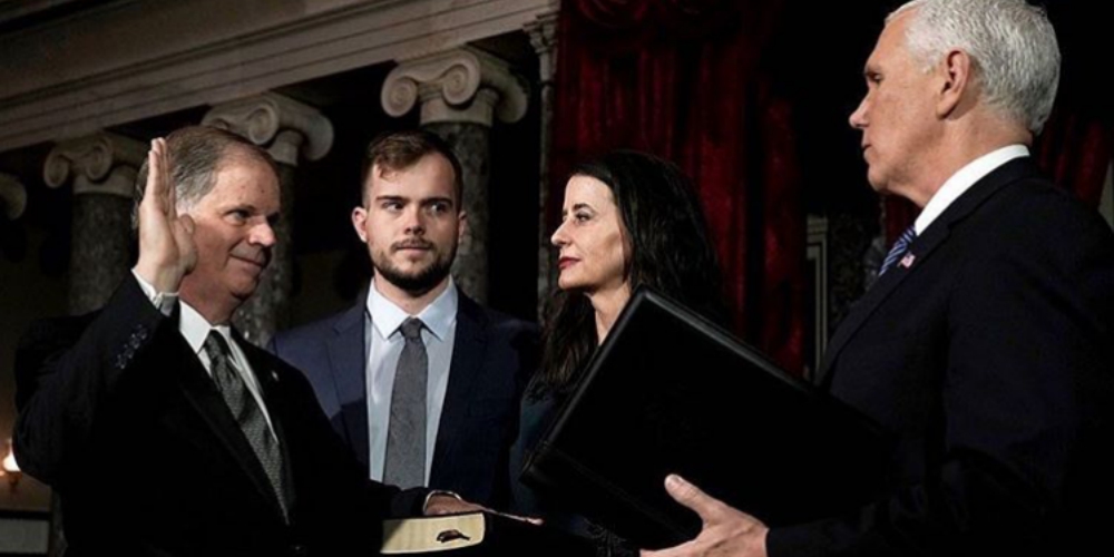 Doug Jones’ Gay Son Gave Mike Pence Some Major Side-Eye at Today’s Swearing In