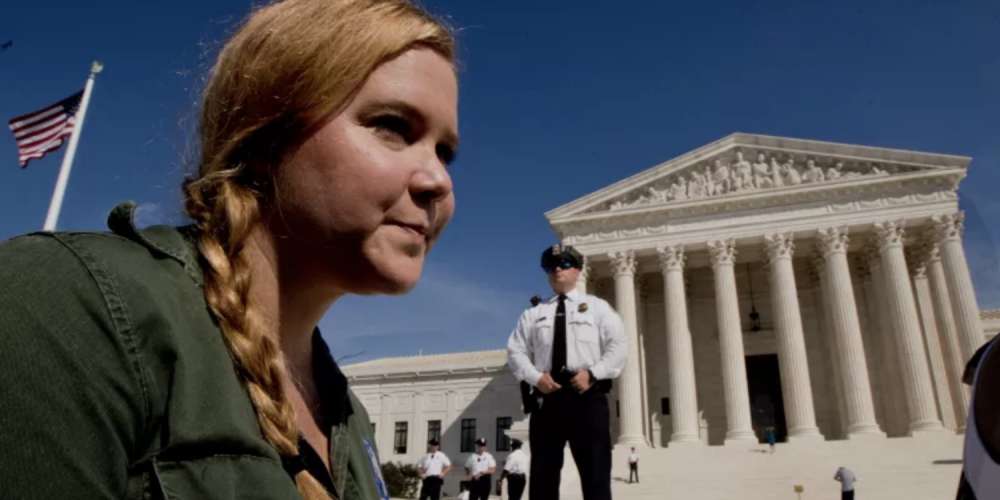 The Daily Sting, Friday: Amy Schumer in Cuffs, Gaga on Kavanaugh, Gayest ‘Jeopardy’ Moment Ever